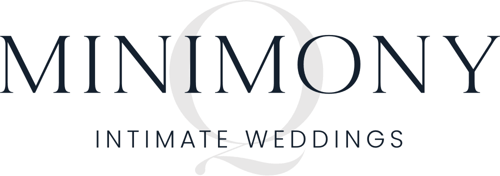 Logo featuring the word Minimony in large, elegant letters with an ornamental letter Q subtly enhancing the theme of Intimate Weddings. Below, the words Intimate Weddings appear in a smaller, refined font. The background is pure white. 124 on Queen Hotel and Spa | Hotel & Spa Niagara-on-the-lake | 1 (855) 988-4552 Logo featuring the word Minimony in large, elegant letters with an ornamental letter Q subtly enhancing the theme of Intimate Weddings. Below, the words Intimate Weddings appear in a smaller, refined font. The background is pure white. 124 on Queen Hotel and Spa | Hotel & Spa Niagara-on-the-lake | 1 (855) 988-4552