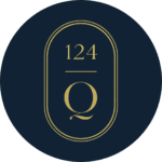 A dark circular logo with a gold outline featuring the number 124 above a horizontal line, and a large letter Q below the line. 124 on Queen Hotel and Spa | Hotel & Spa Niagara-on-the-lake | 1 (855) 988-4552